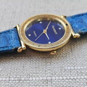 Penatech Quartz Ladies Wristwatch Blue Leather Band Gold Tone Case Watch